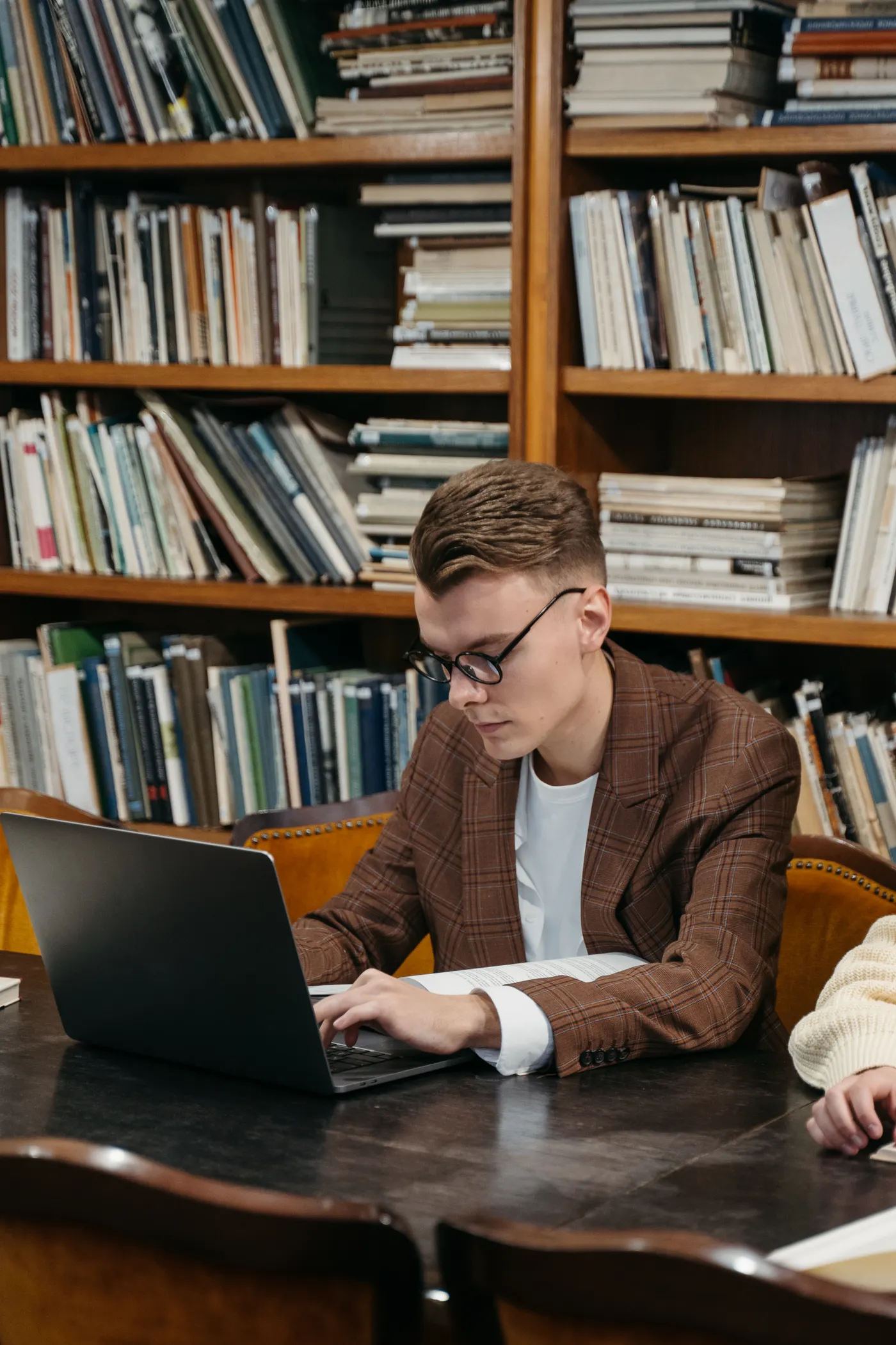 Family using a library technology resource to compare tablet access options